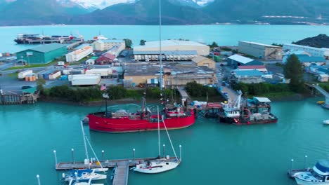 4k drone video of boats and ships in valdez commercial boat harbor in valdez, ak during sunny summer day