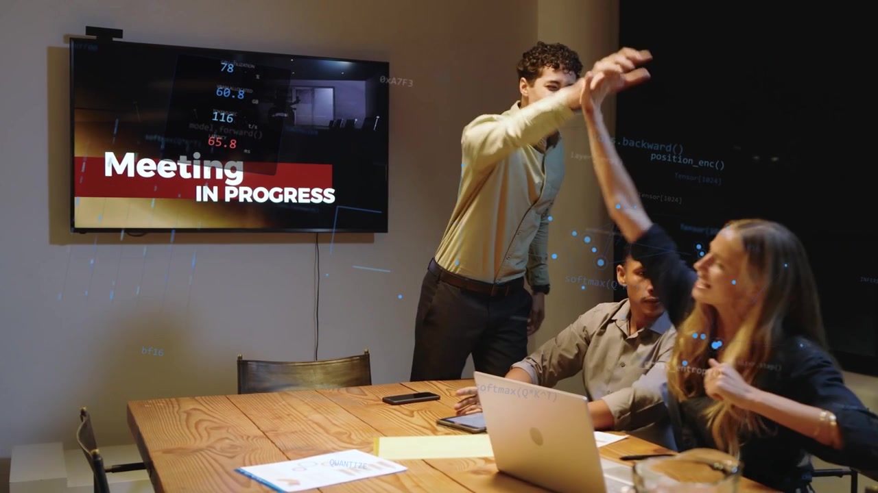 Standing coworker approaching seated duo gesturing cheering, high-fiving by laptop for business win