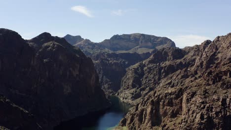 aerial view over a river, in the highlands of kingman, usa - rising, drone shot