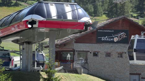 cable car arriving at mountain station