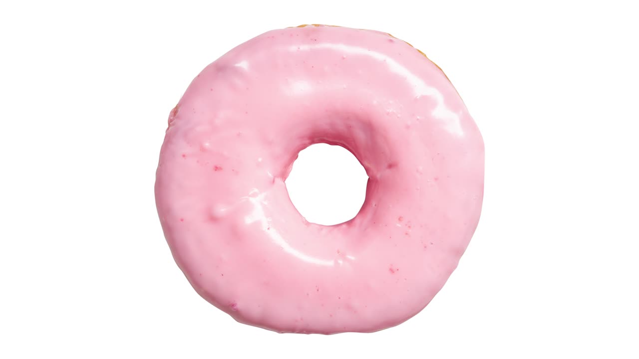 vista superior de una rosquilla rosada de fresa comiendo en un fondo blanco