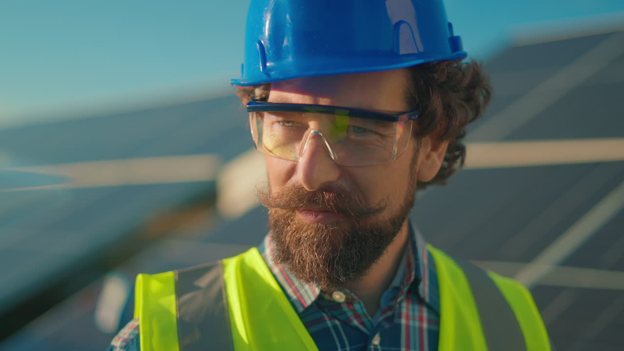 Construction worker near solar panels