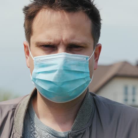 Portrait-Of-A-Young-Man-In-A-Protective-Medical-Mask-1