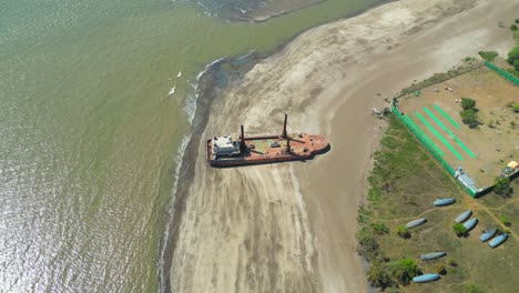 side of river big old boat wide to closeup bird eye view