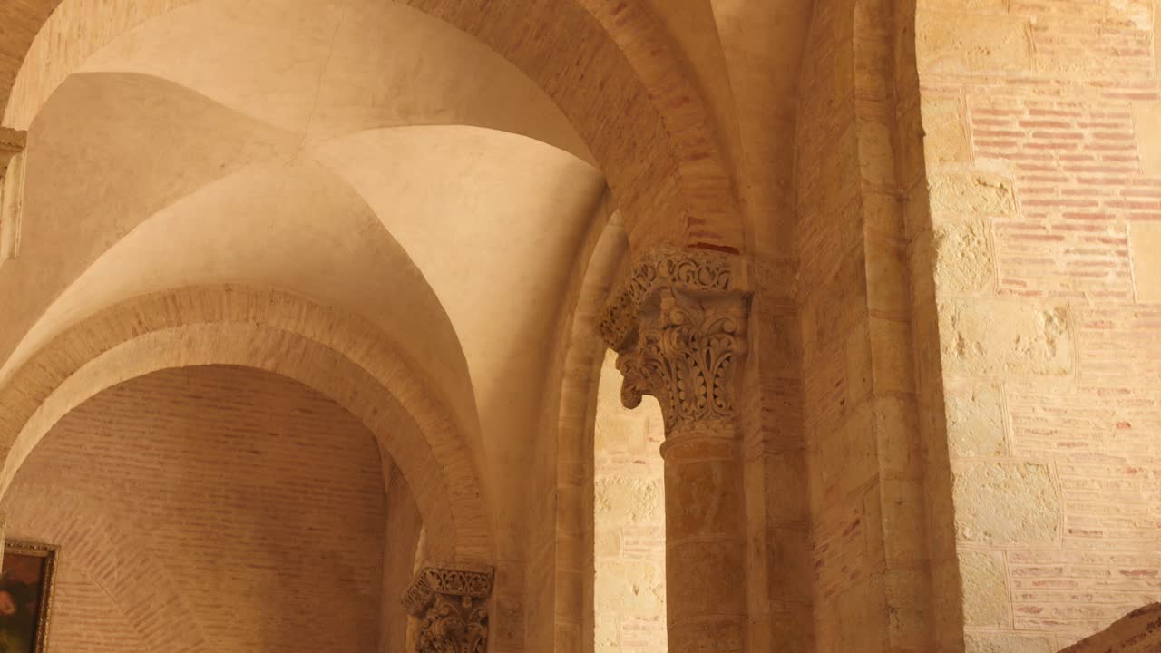 Vaulted Ceilings And Brick Walls Of Basilica of Saint-Sernin In Toulouse, France. - wide shot