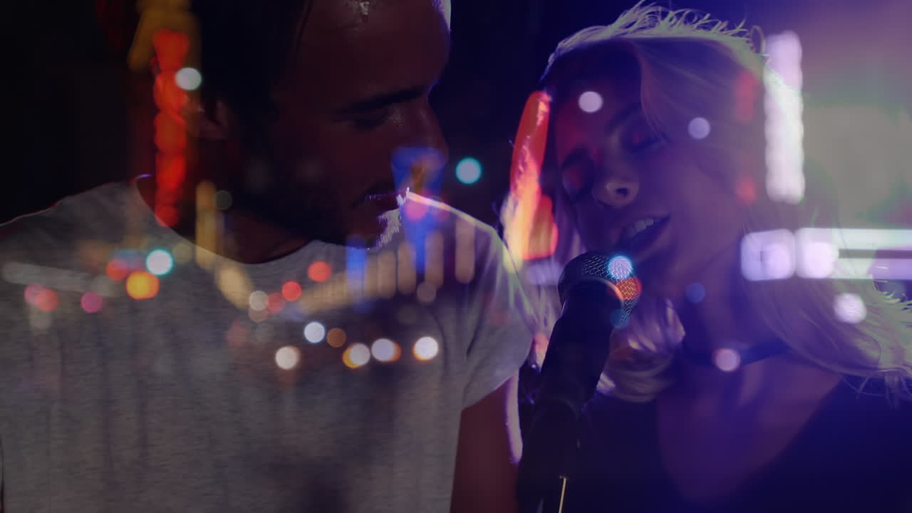 Animation of blurred road traffic over caucasian female and male singers