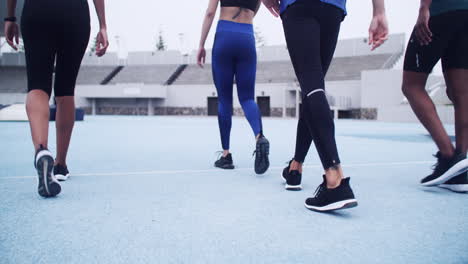 people walking on a track