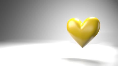 pulsing yellow heart shape object on white text space.