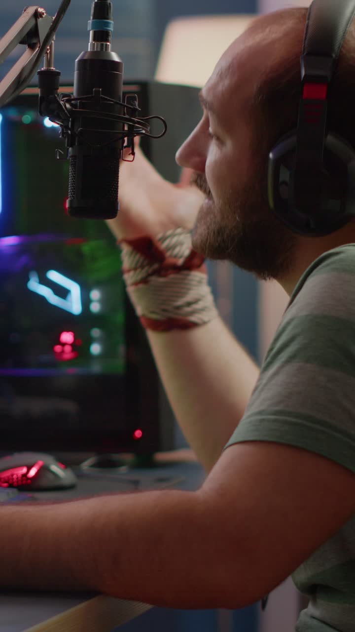 Gamer Live Streaming on PC with Headphones and Microphone