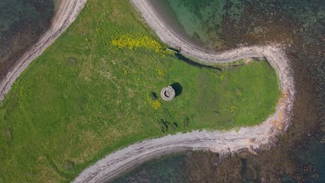 top-down aerial view of the martello tower on shenick island in coastal ireland