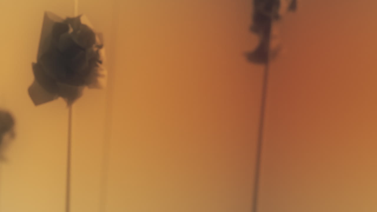 Crushed android heads on spikes on the yellow background