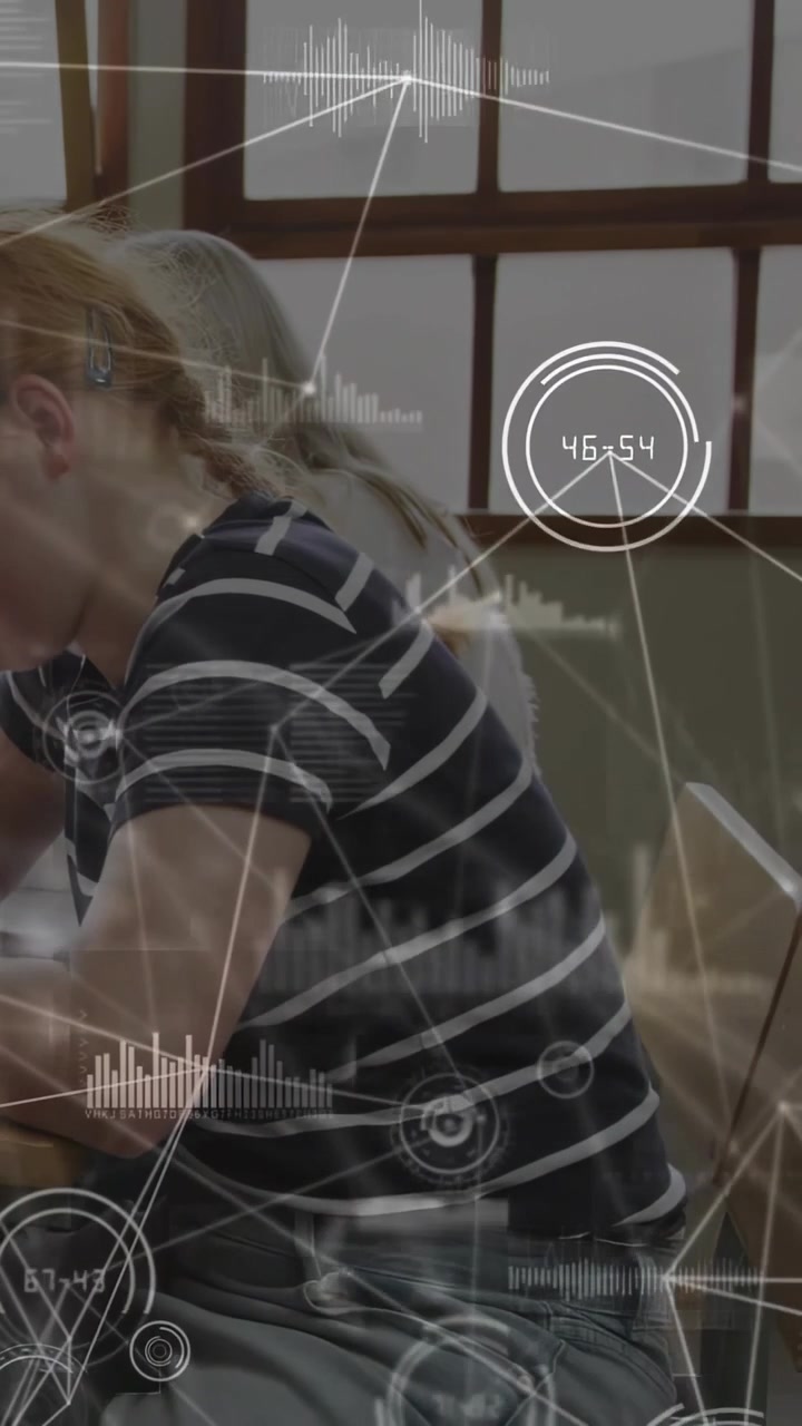 Vertical video: Student writing in class camera shifting as HUD overlay filling frame with charts