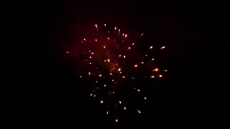 fireworks display on dark night sky in slow motion blur