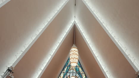 panning shot inside of the famous cathedral in tromso, norway - above the arctic circle