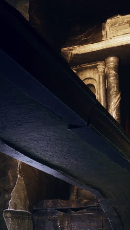 a close-up of an ancient stone archway in a ruined temple.