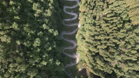 top down view of kossdalssvingene moving down the hill with beautiful nature in osterøy, norway