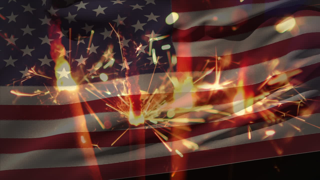 Animation of close up of sparklers against american flag waving