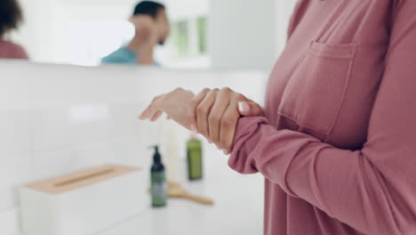 Hands,-cream-and-beauty,-person-in-bathroom