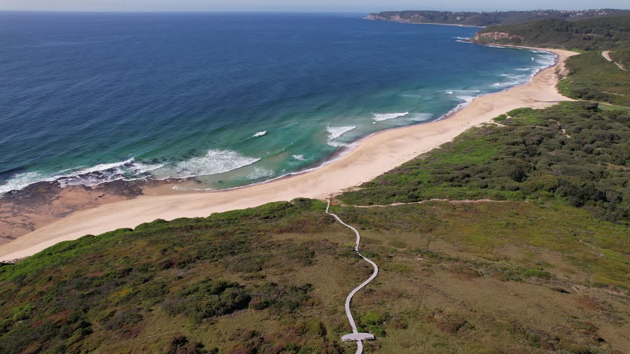 Dudley Beach With Turquoise Ocean In New South Wales, Australia - Aerial Pullback