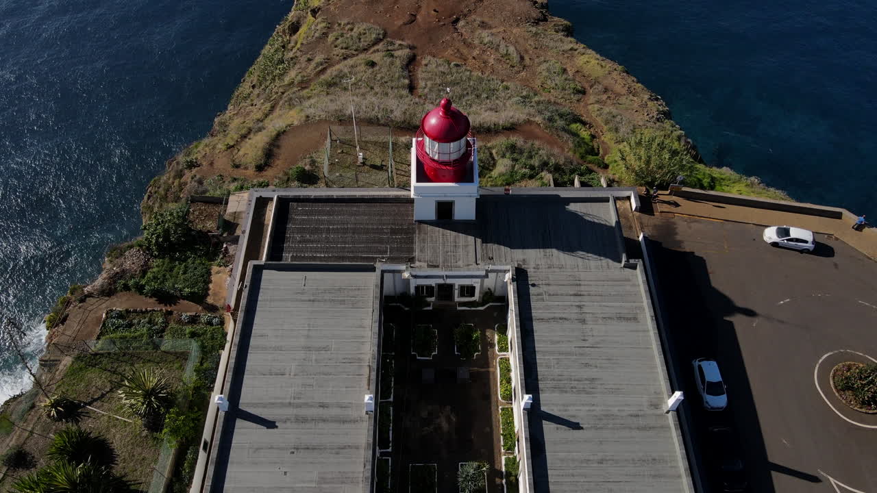 &amp;quot;Panoramic views of Madeira island from Ponta do Pargo Lighthouse - A shot that shows the lighthouse and the surrounding landscape of the island from a high perspective