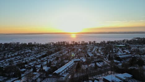 golden hour by the great lakes during winter time and sunset