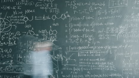 mathematical equations on a chalkboard