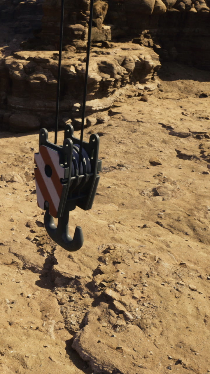 Heavy equipment used for lifting on rocky terrain at construction site