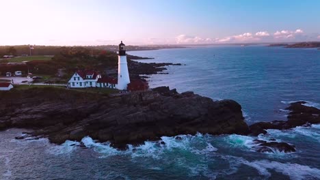 great aerial shot over the portland head lighthouse suggests americana or beautiful new england scenery 3