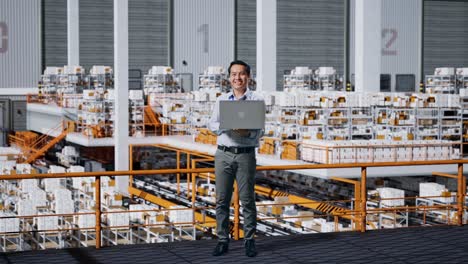 warehouse worker with laptop