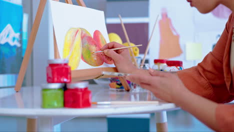 art, hands and closeup of painting on canvas