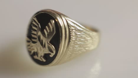 a silver ring with eagle designed head - close-up shot