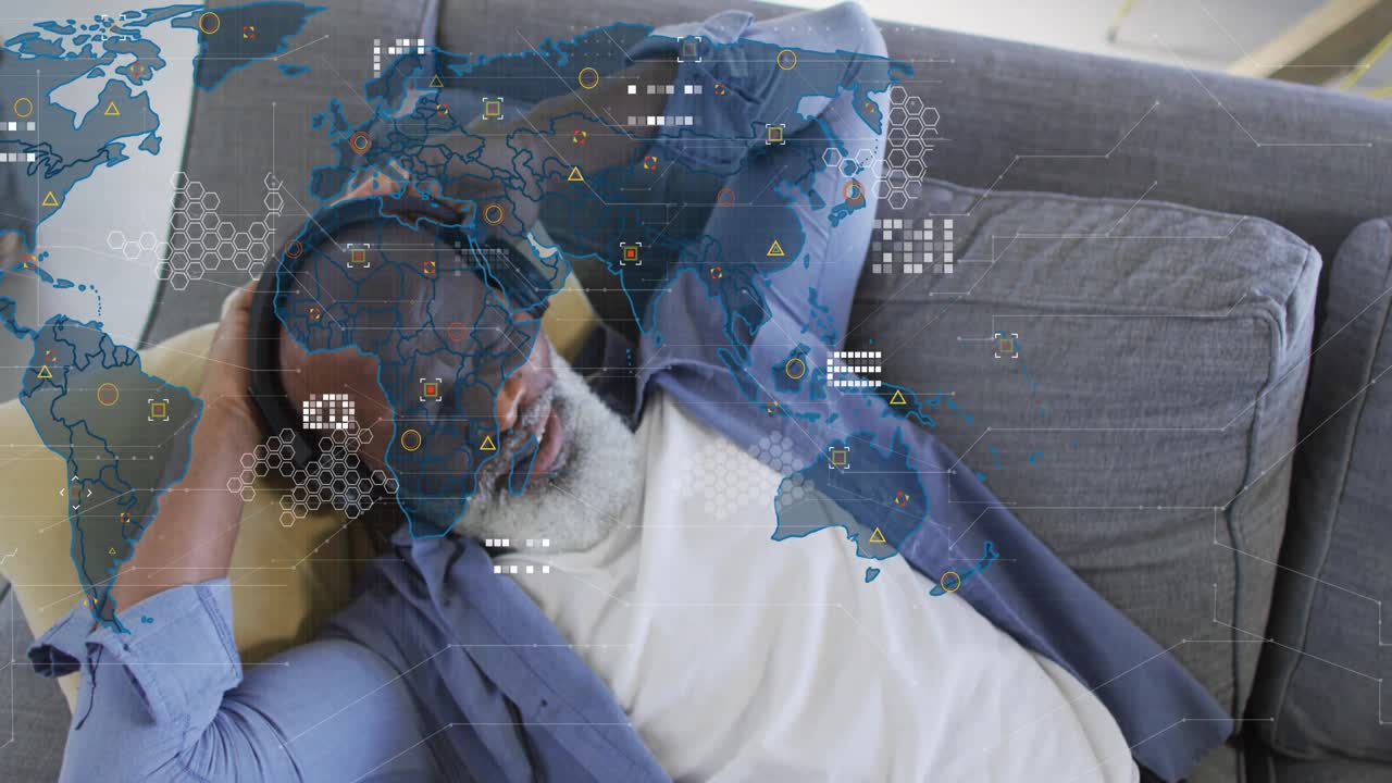 Reaching up for headphones senior man placing headset as world map overlay emerging with tech data