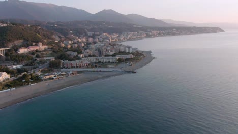 drone-shot-of-a-beautiful-spring-sunrise-at-a-small-coast-city-of-west-italy-in-varazze