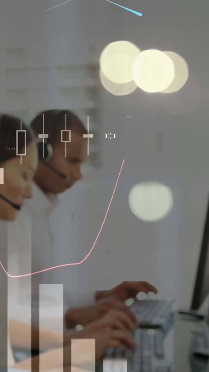 Vertical video: Two reps typing, left rep speaking, causing finance charts over scene for clients