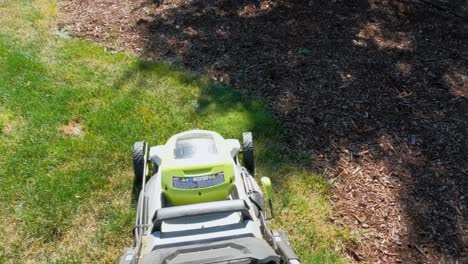 first person view of mowing a lawn with