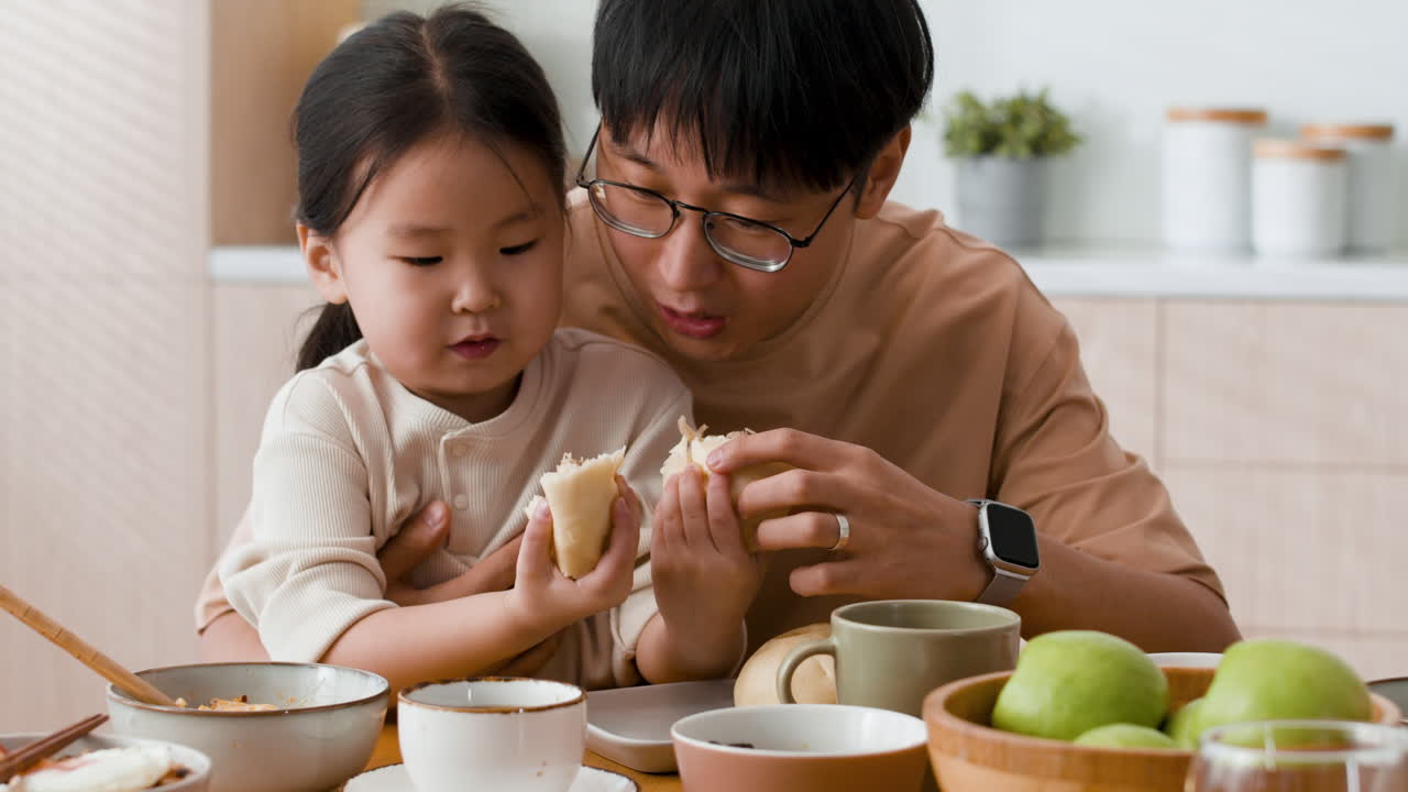 Father and Daughter Having Breakfast/Lunch/Dinner Together