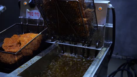 close up shot of deep fry chicken breast in catering food factory