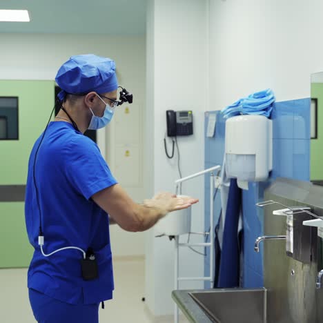 doctor washing hands before operating. hospital concept