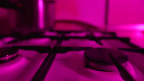 close-up of a gas stovetop at night