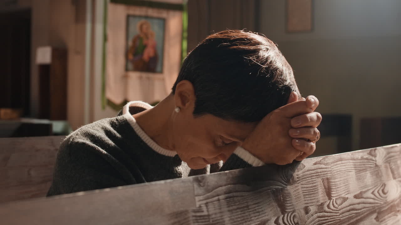 Woman Praying in Church