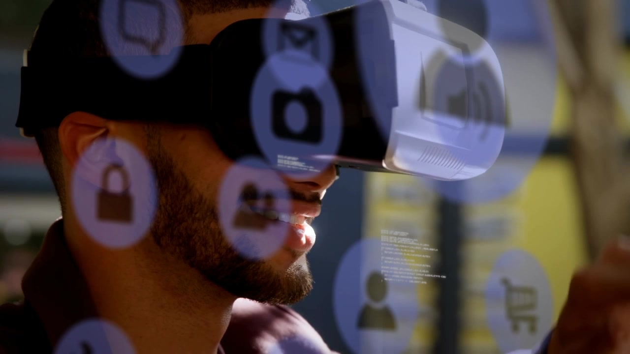 Young Man Smiling While Using Virtual Reality Headset