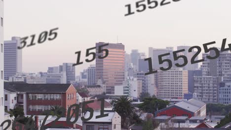 animation of changing numbers against aerial view of cityscape