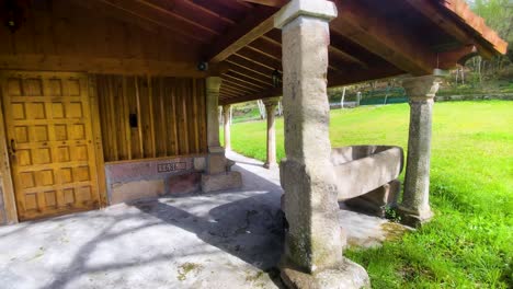 Establishing-frontal-pan-of-hermitage-door-of-wooden-chapel-with-concrete-beams