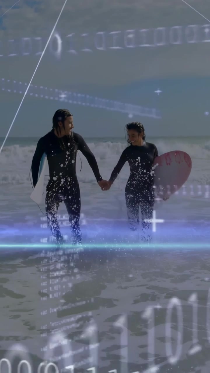 Vertical video: Couple returning to shore, stepping toward camera with boards, binary data on suits