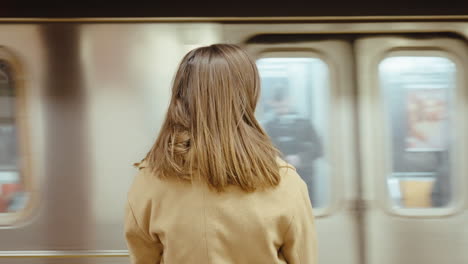 woman waiting for subway