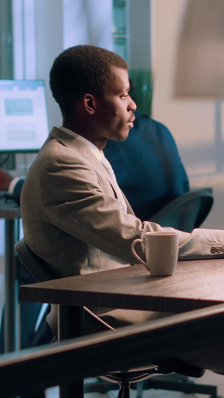 Vertical video Accountant working during nightshift