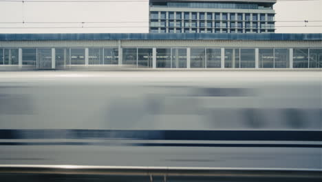 high-speed train passing through station