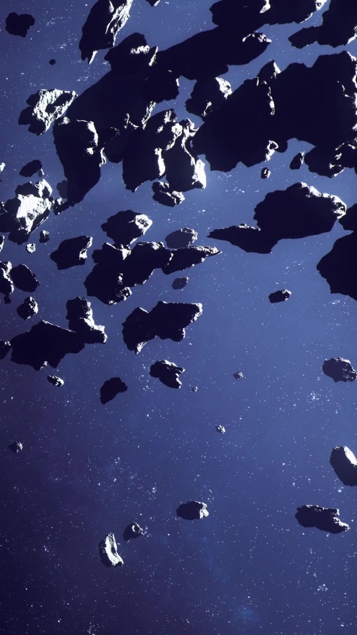 Asteroids floating in space with dark background and distant stars