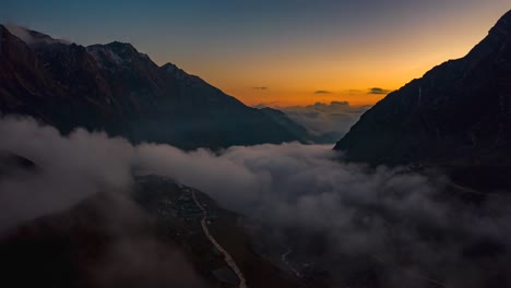 Clouds-at-sunset-over-the-Himalayan-mountain-valley-in-Asia--Time-lapse