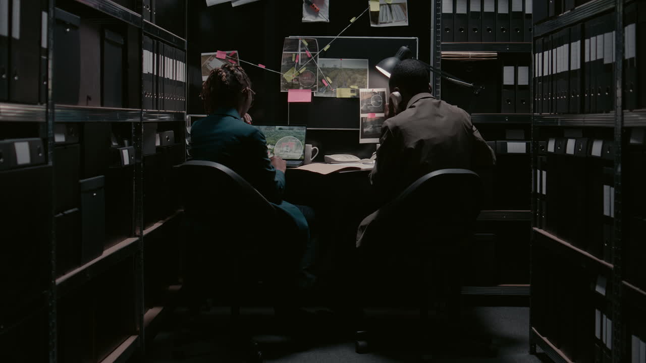 Detectives Working on a Case in Their Office